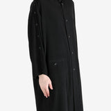 black jackets-coats worn by a person, showing the jackets-coats fit