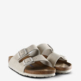 Tan sandals, side view