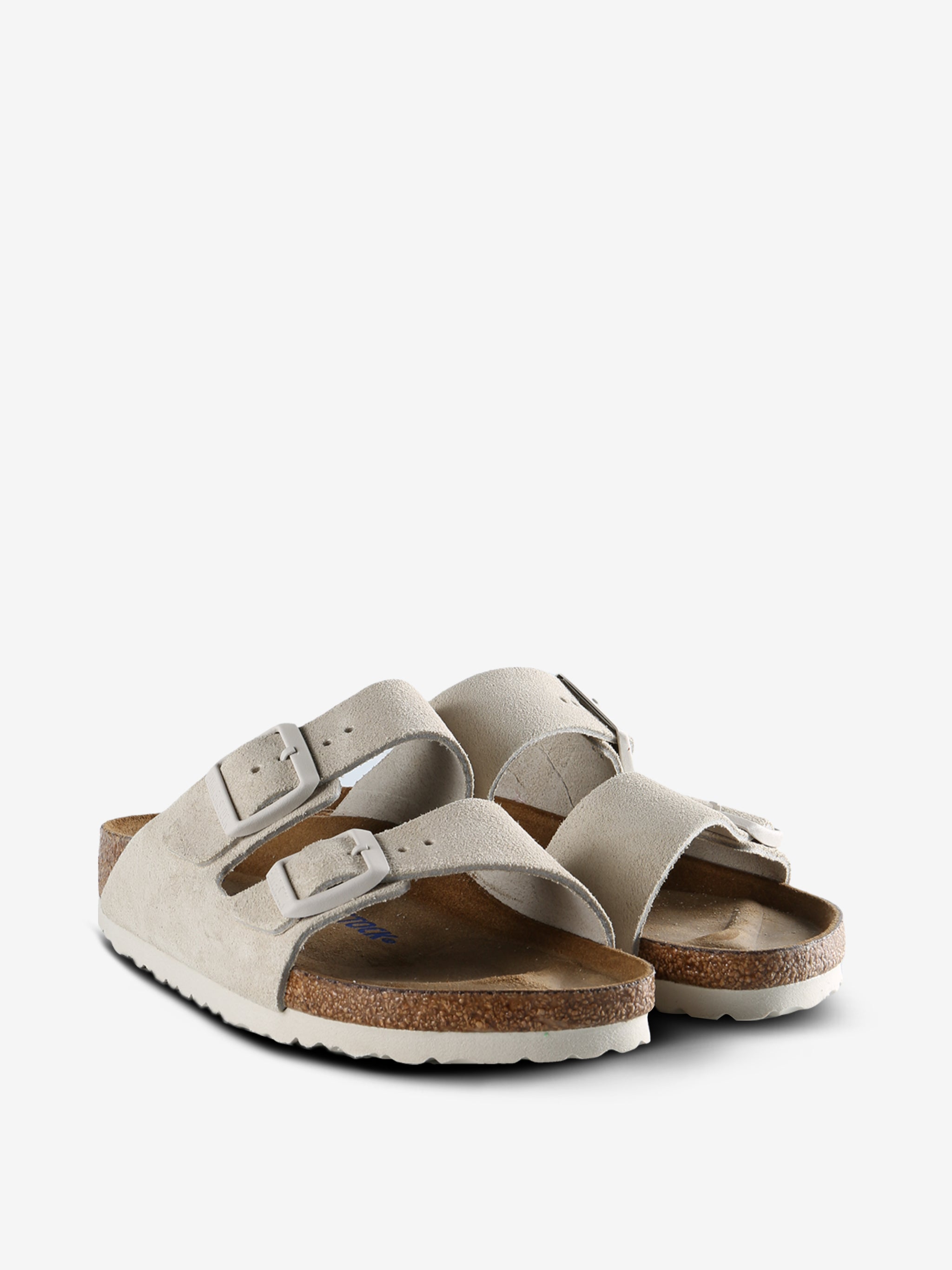 Tan sandals, side view