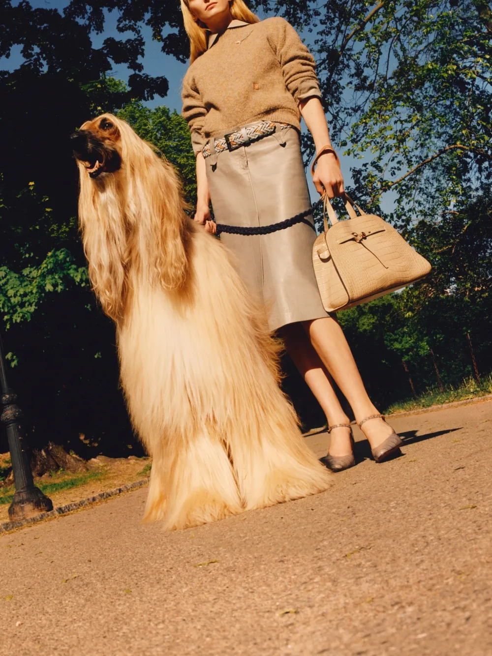 Tan bag worn by a person, showing the bag fit