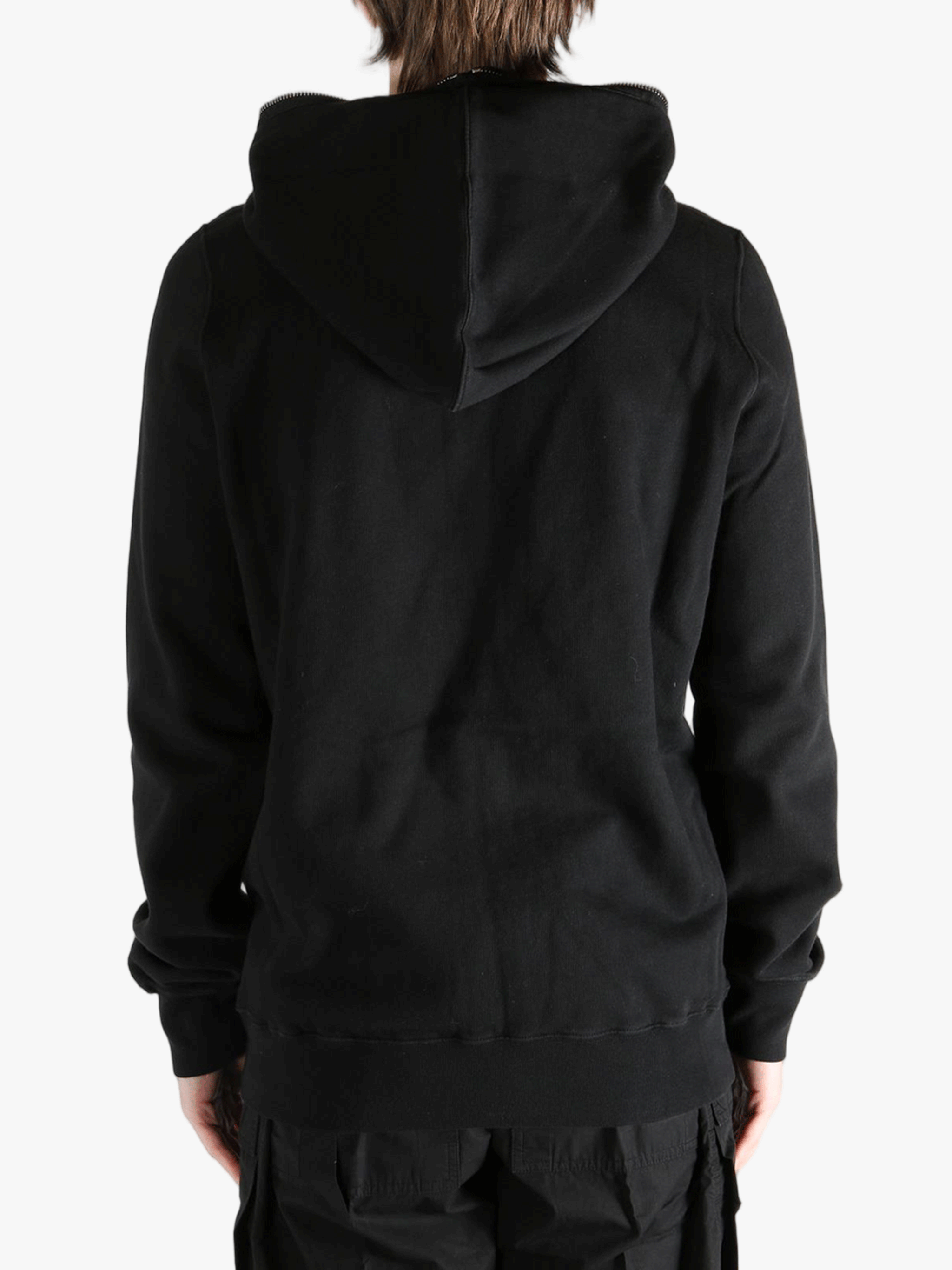 Black hoodie worn by a person, showing the hoodie fit