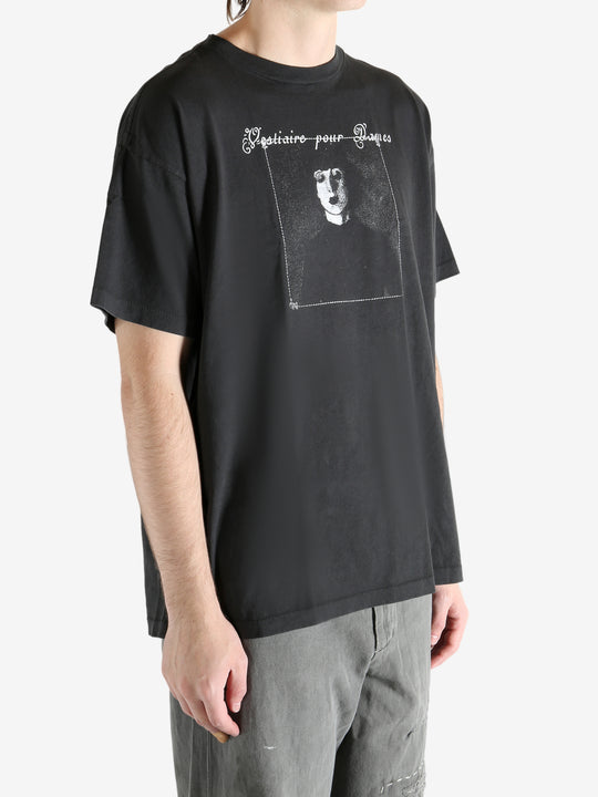 Black t-shirt worn by a person, showing the t-shirt's fit