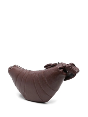 Brown croissant bag, side view