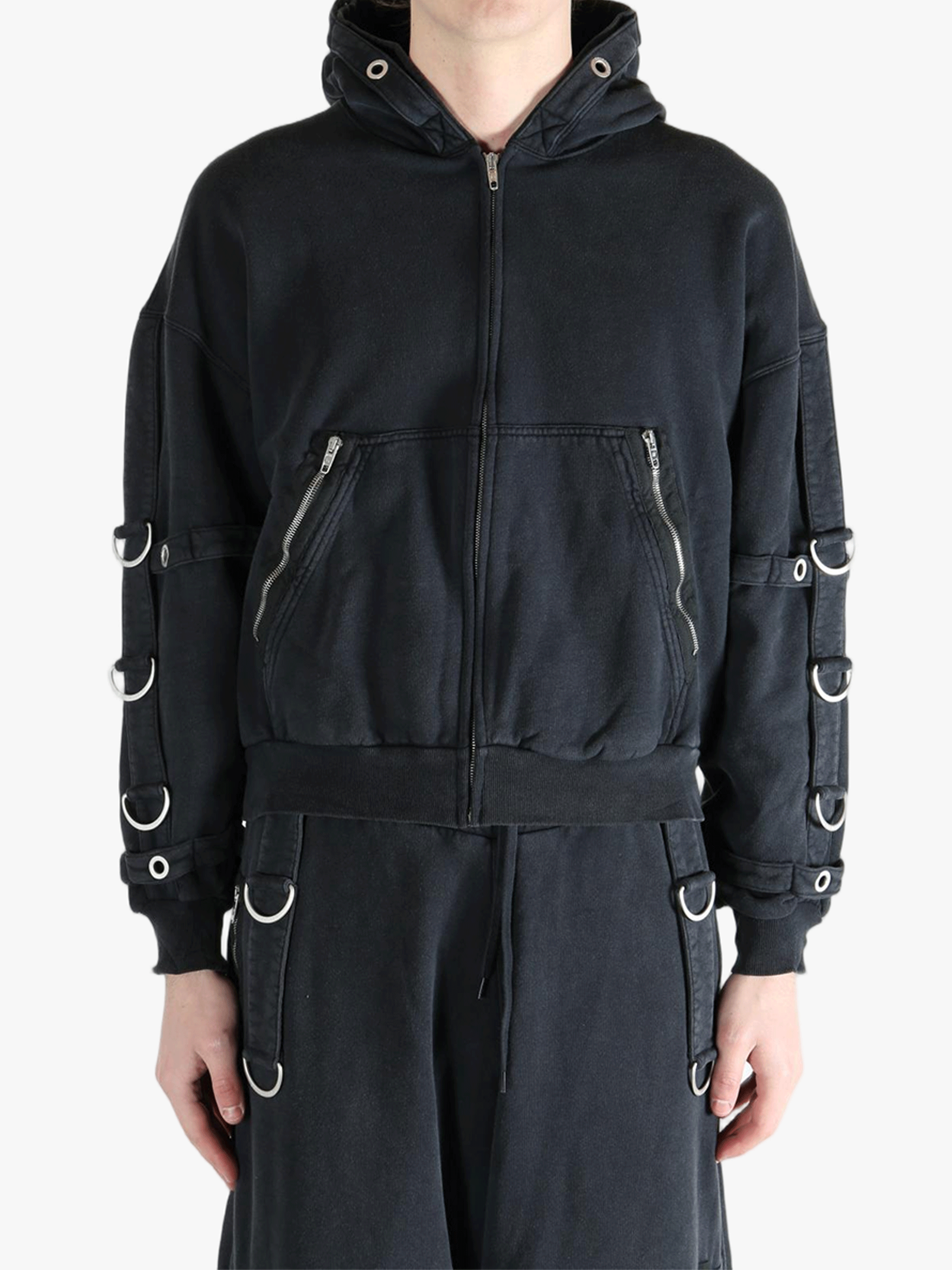 Black jacket worn by a person, showing the jacket's fit