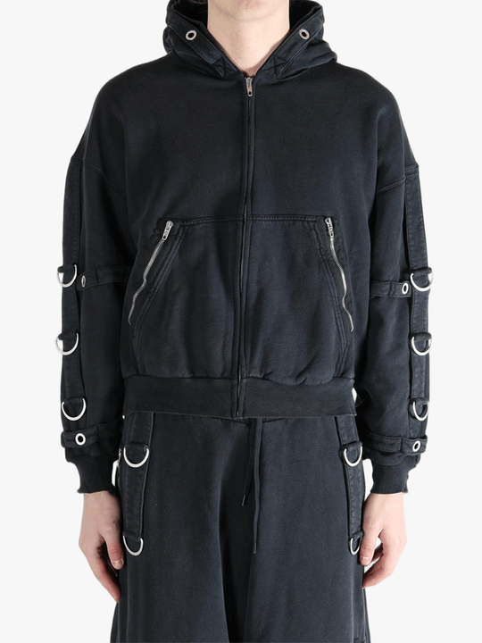 Black jacket worn by a person, showing the jacket's fit