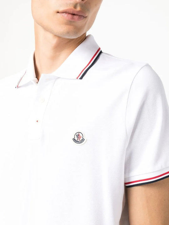 Close up of the white shirt, showing texture of the cotton fabric