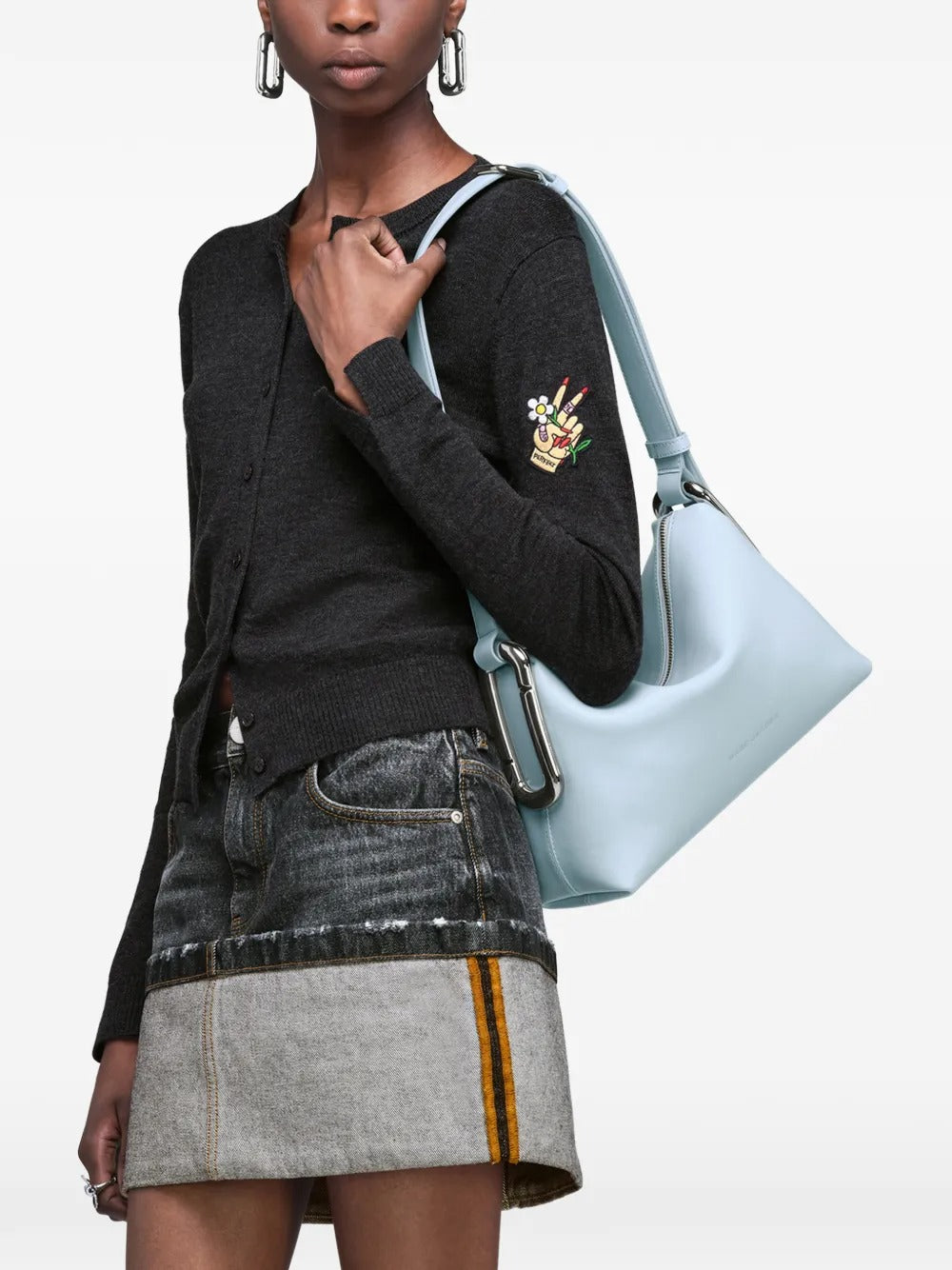 Blue bag worn by a person, showing the bag fit