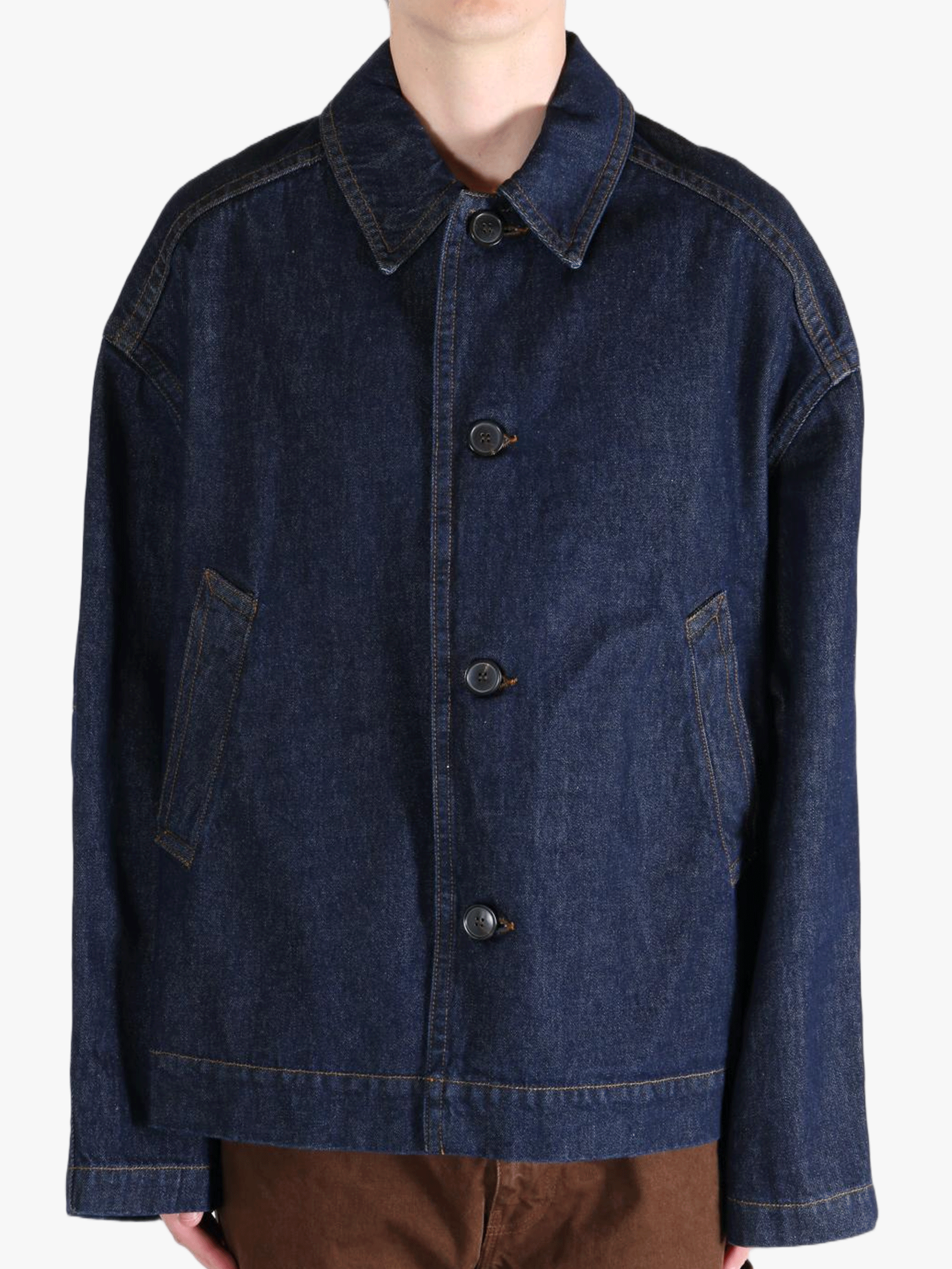 Navy jacket worn by a person, showing the jacket's fit