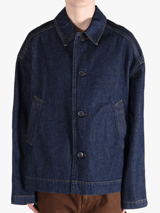 Navy jacket worn by a person, showing the jacket's fit
