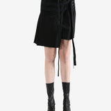 Black skirt worn by a person, showing the skirt's fit