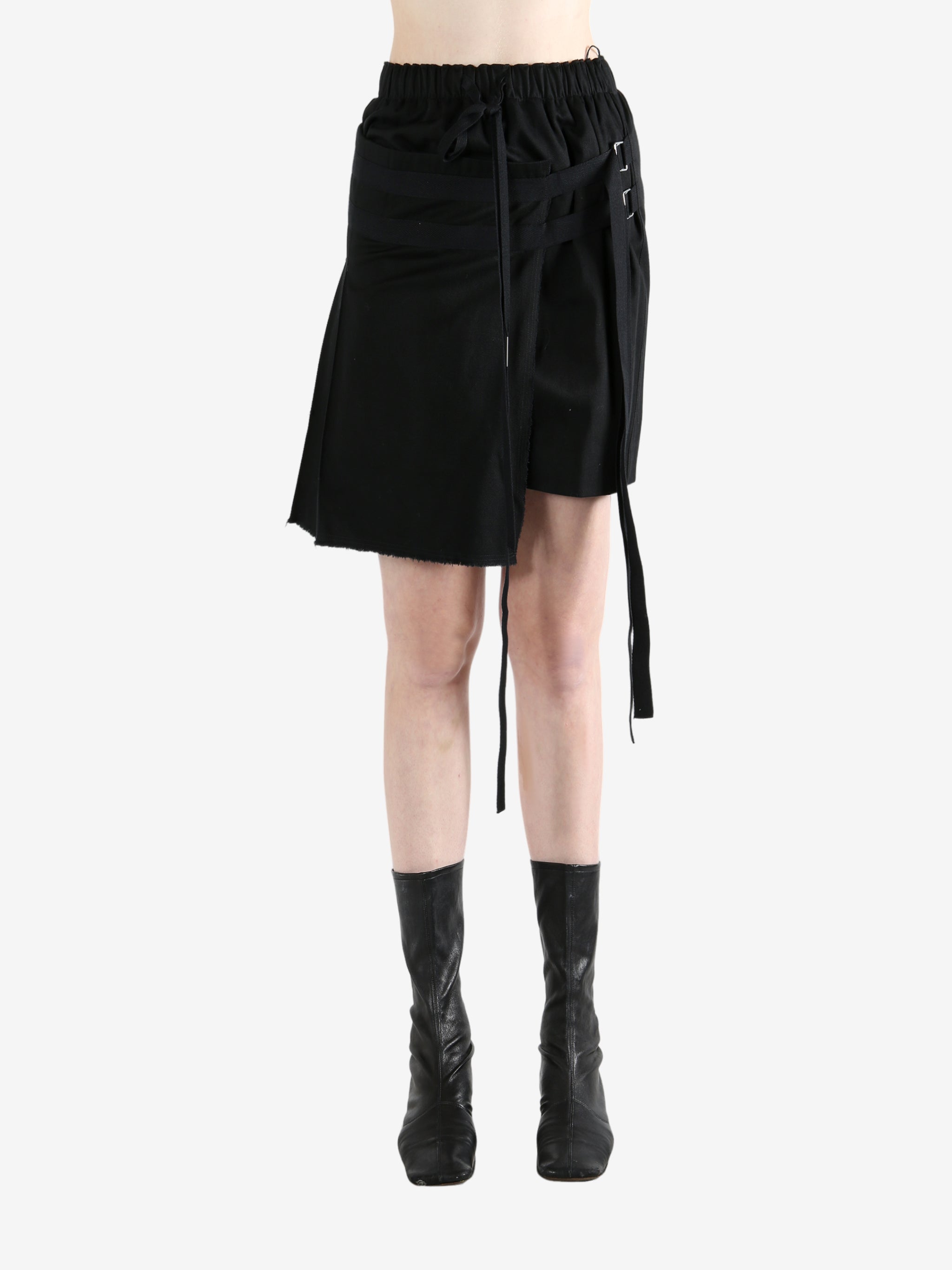 Black skirt worn by a person, showing the skirt's fit