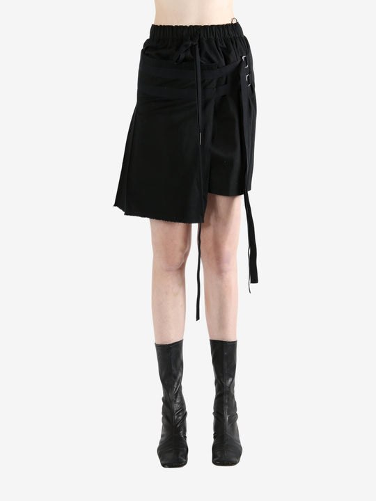 Black skirt worn by a person, showing the skirt's fit