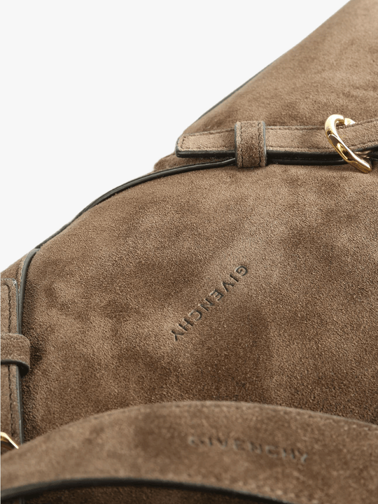 Close up of brown bag, showing texture of the calf leather fabric