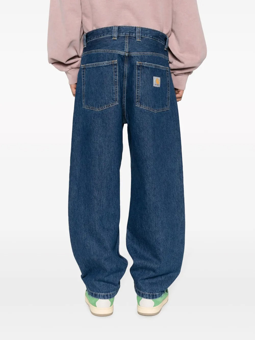 Blue pants worn by a person, showing the pants' fit