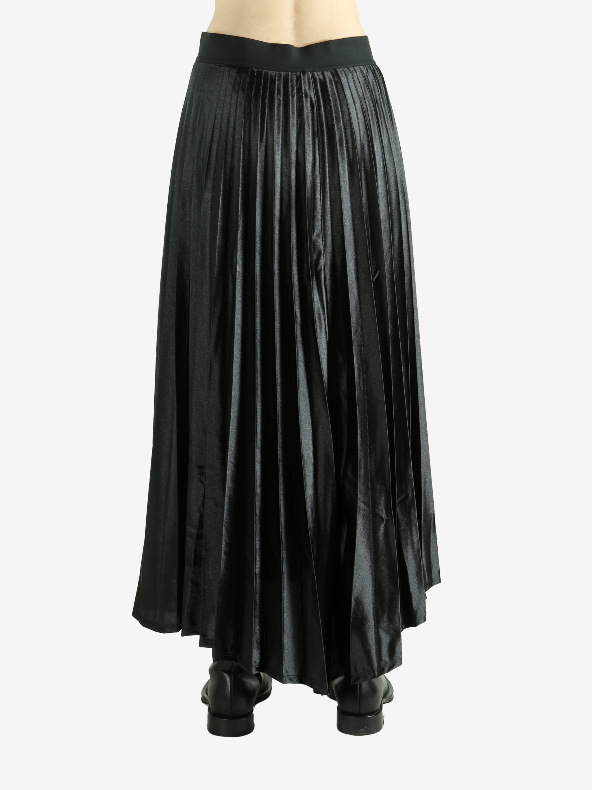 Black skirt worn by a person, showing the skirt's fit
