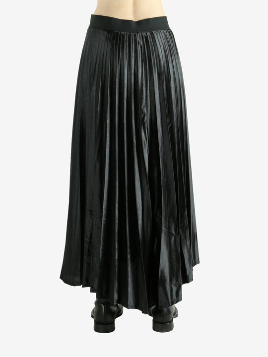 Black skirt worn by a person, showing the skirt's fit