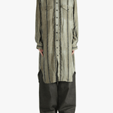 Grey top worn by a person, showing the top's fit