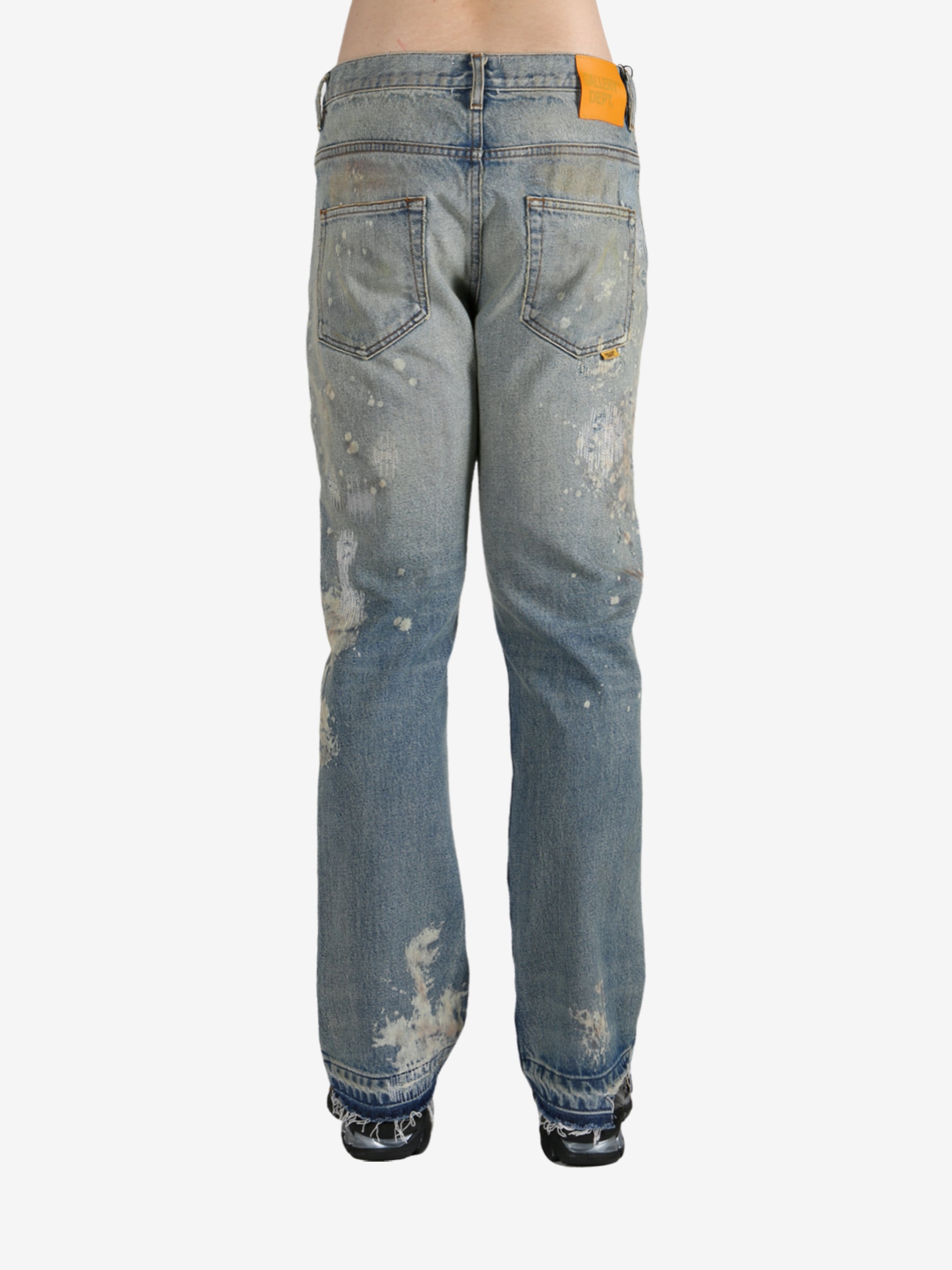 Blue jeans worn by a person, showing the jeans's fit