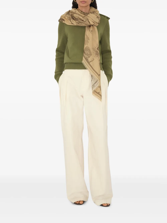 Tan scarf worn by a person, showing the scarf fit