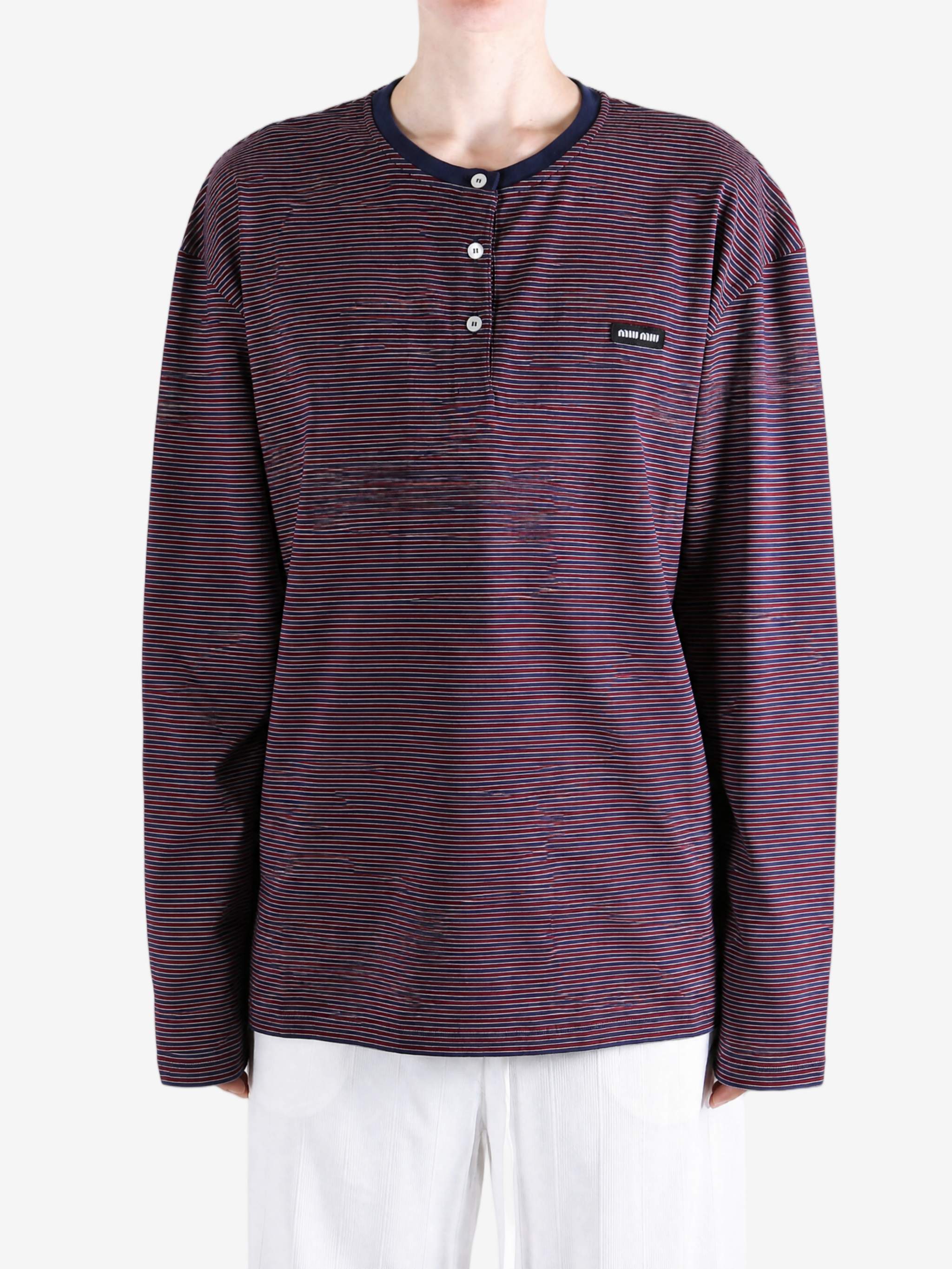 Navy top worn by a person, showing the top fit