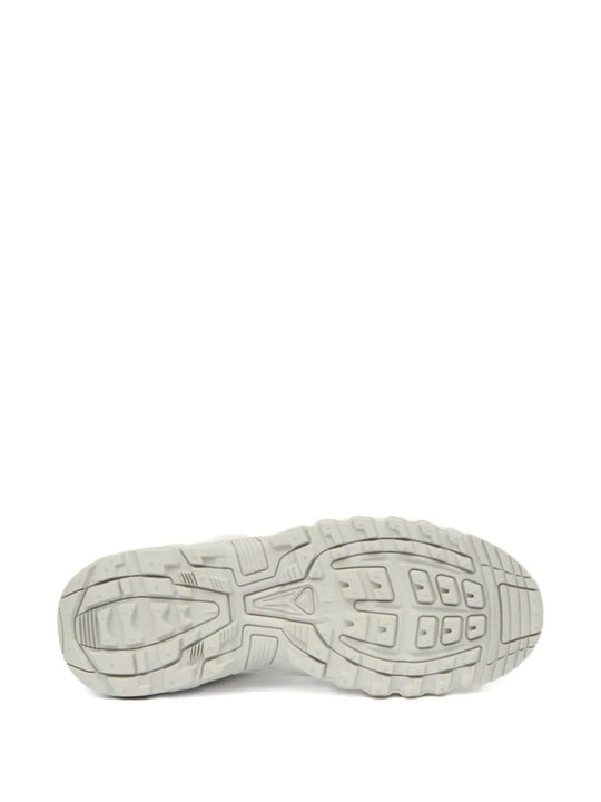 Cloes up of white sneakers, showing texture of the fabric