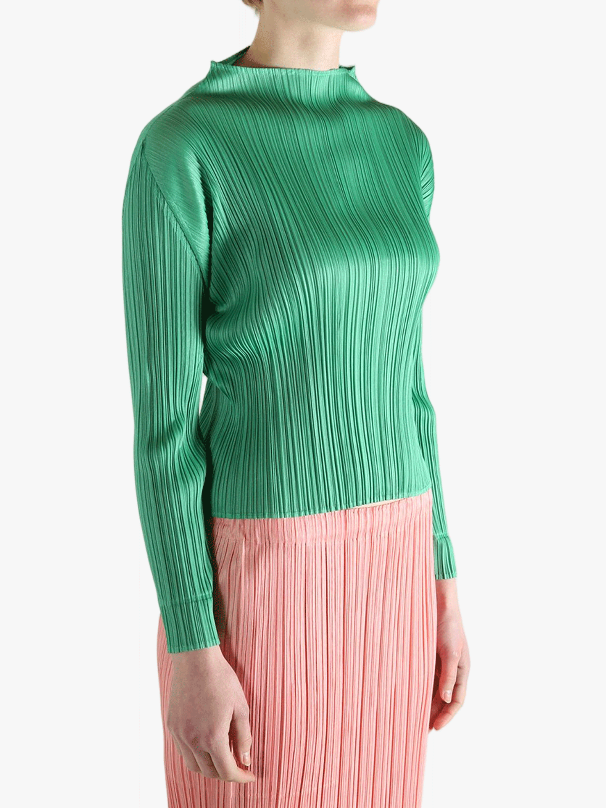 Green shirt worn by a person, showing the shirt's fit