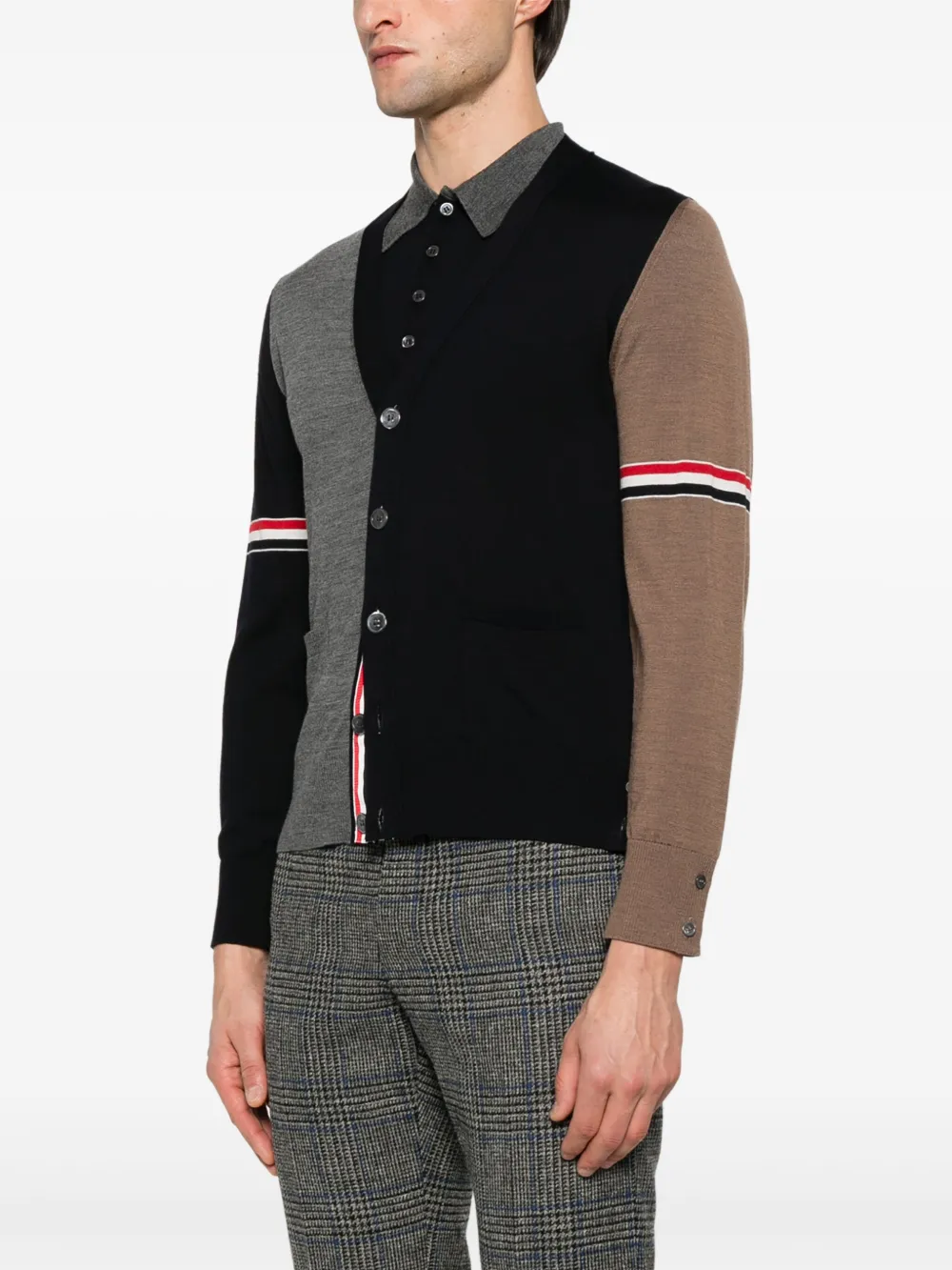 Blue knitwear worn by a person, showing the knitwear's fit