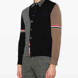 Blue knitwear worn by a person, showing the knitwear's fit