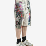 White shorts worn by a person, showing the shorts's fit