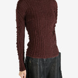 Brown shirt worn by a person, showing the shirt's fit