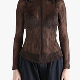 Brown shirt worn by a person, showing the shirt fit