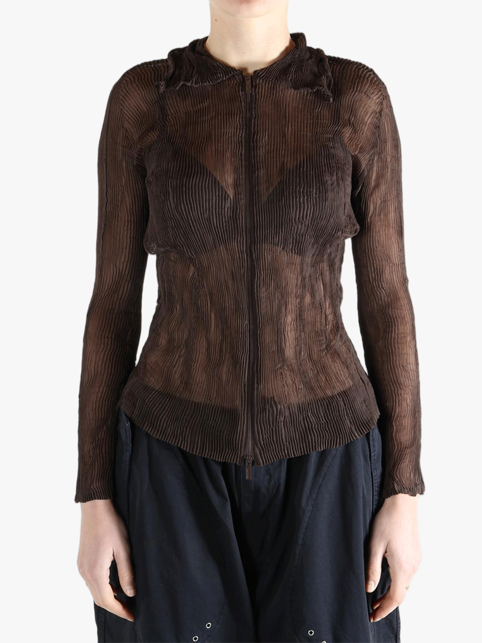 Brown shirt worn by a person, showing the shirt fit
