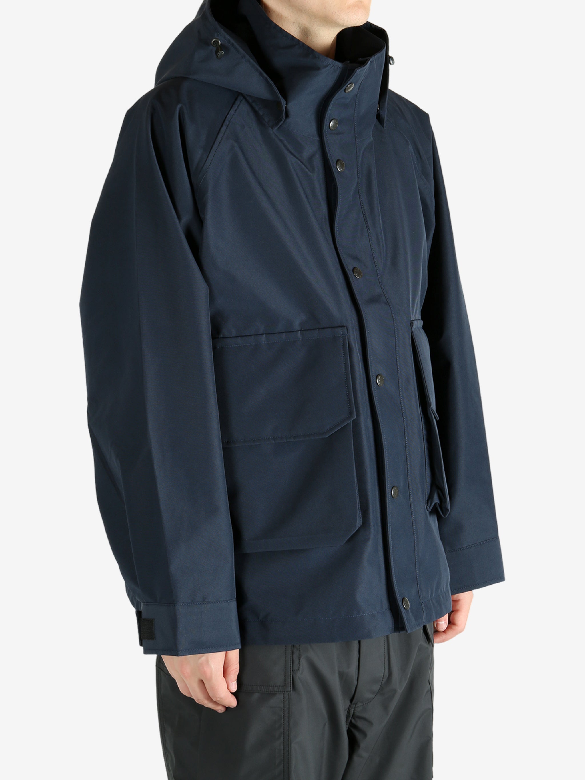 Navy jacket worn by a person, showing the jacket's fit