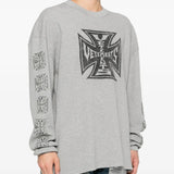 Grey sweats worn by a person, showing the sweats' fit