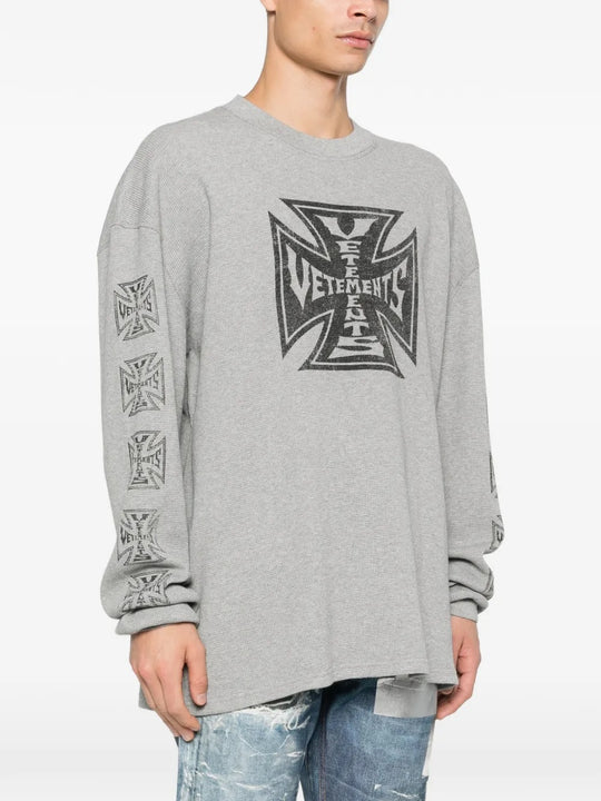 Grey sweats worn by a person, showing the sweats' fit