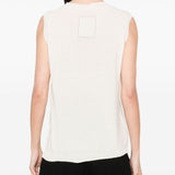 Unknown top worn by a person, showing the top fit