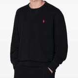 Black sweatershirt worn by a person, showing the sweatershirt's fit
