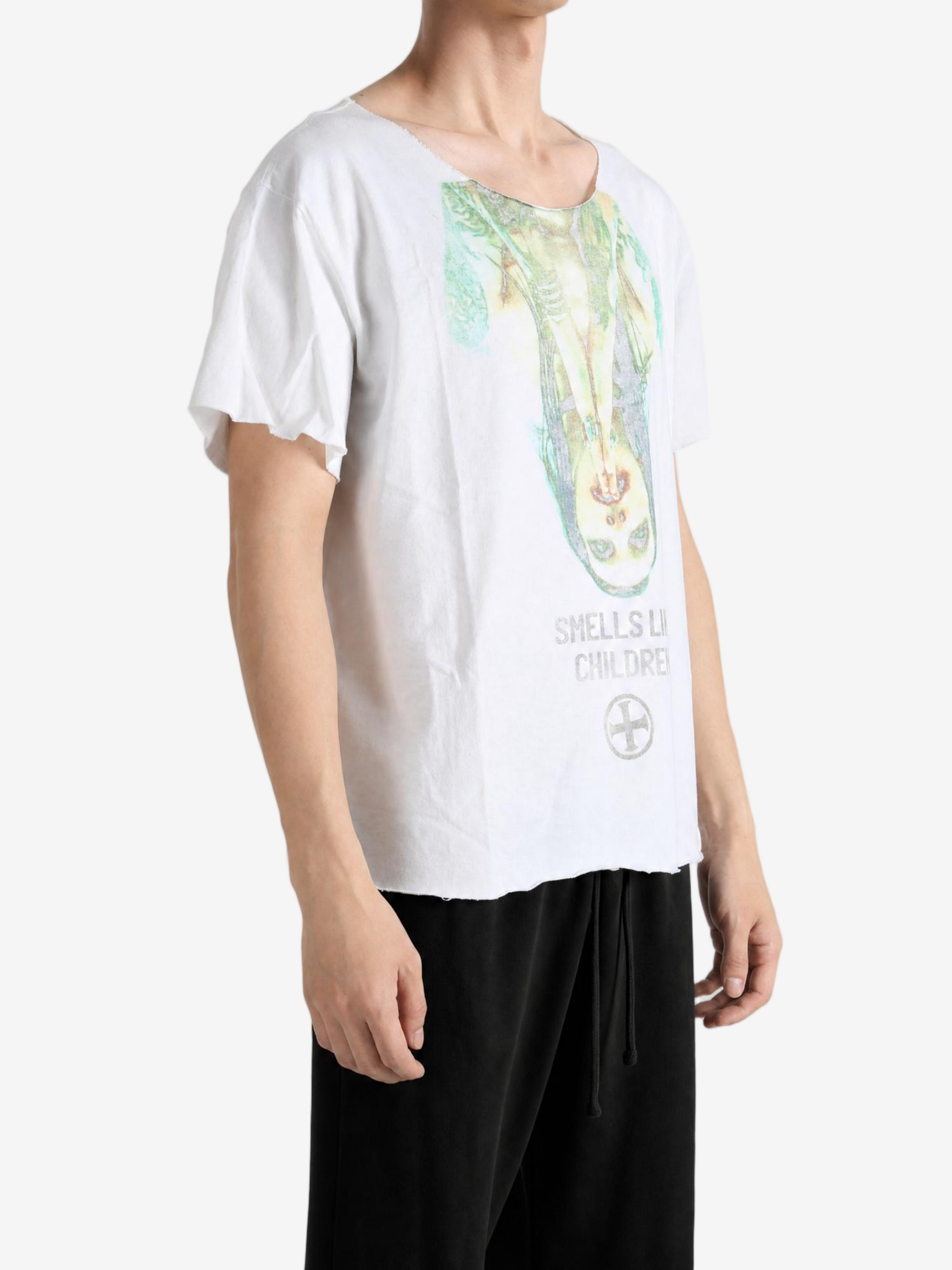 White t-shirt worn by a person, showing the t-shirt fit