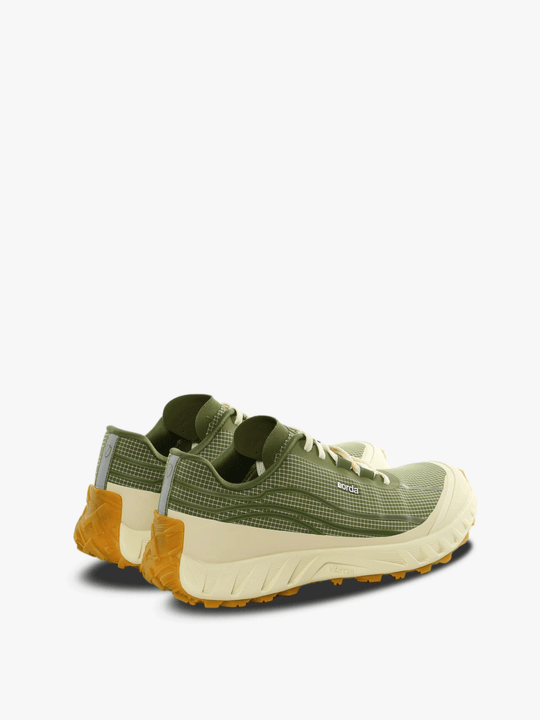 Green sneakers, side view