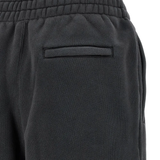 Close up of black pants, showing texture of the cotton fabric