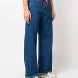 blue jeans worn by a person, showing the jeans fit