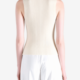 Tan top worn by a person, showing the top fit