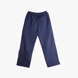 Navy pants, back view showing slim fit