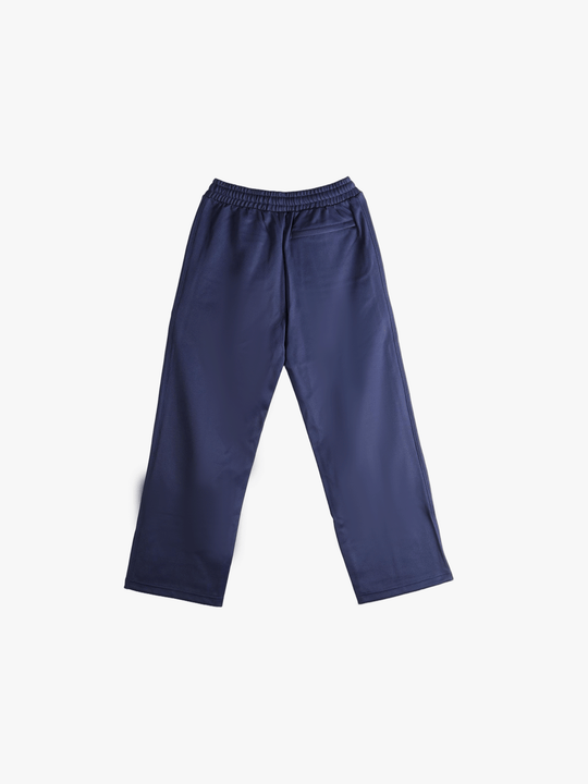 Navy pants, back view showing slim fit