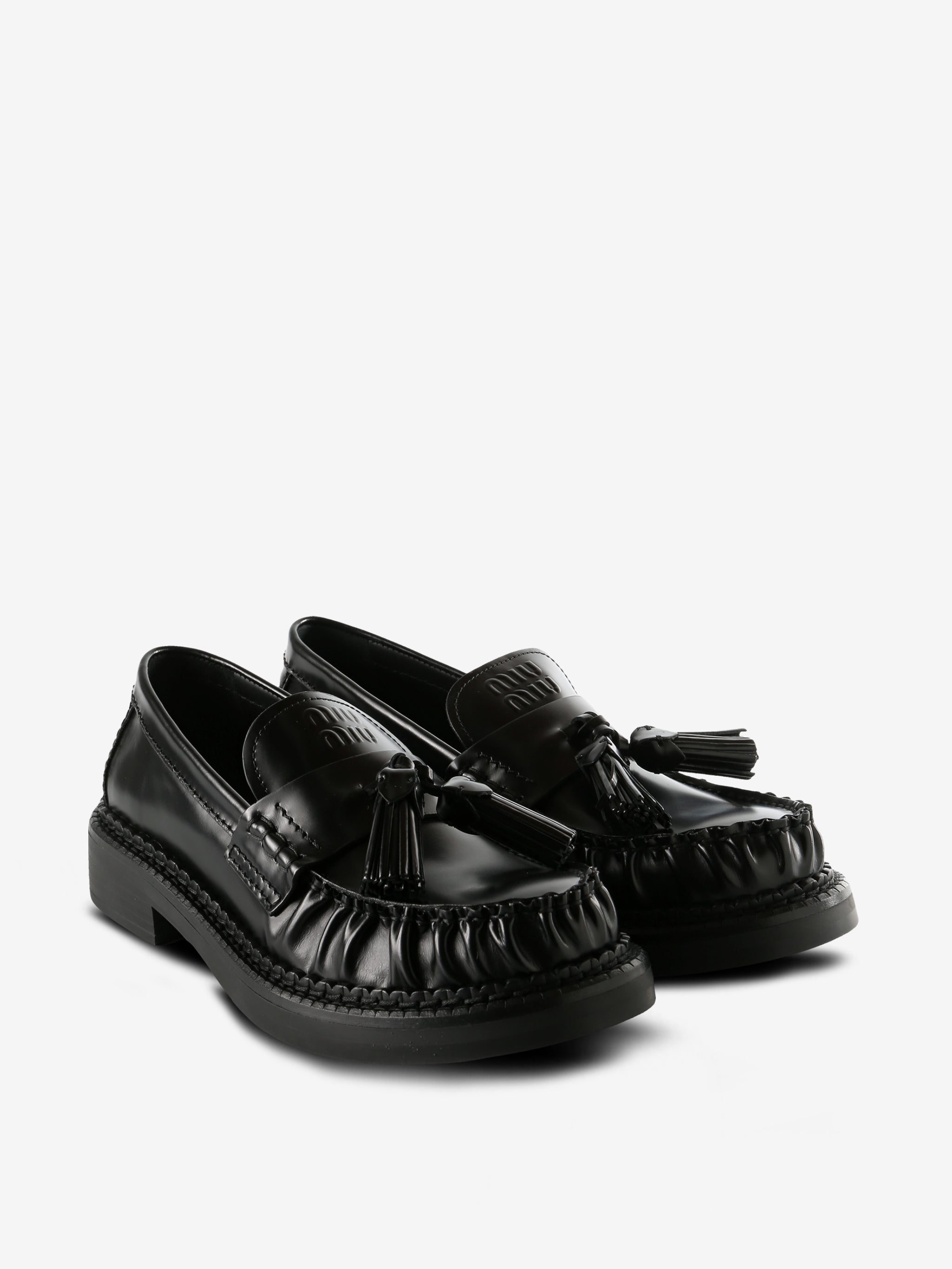 Black loafer, side view