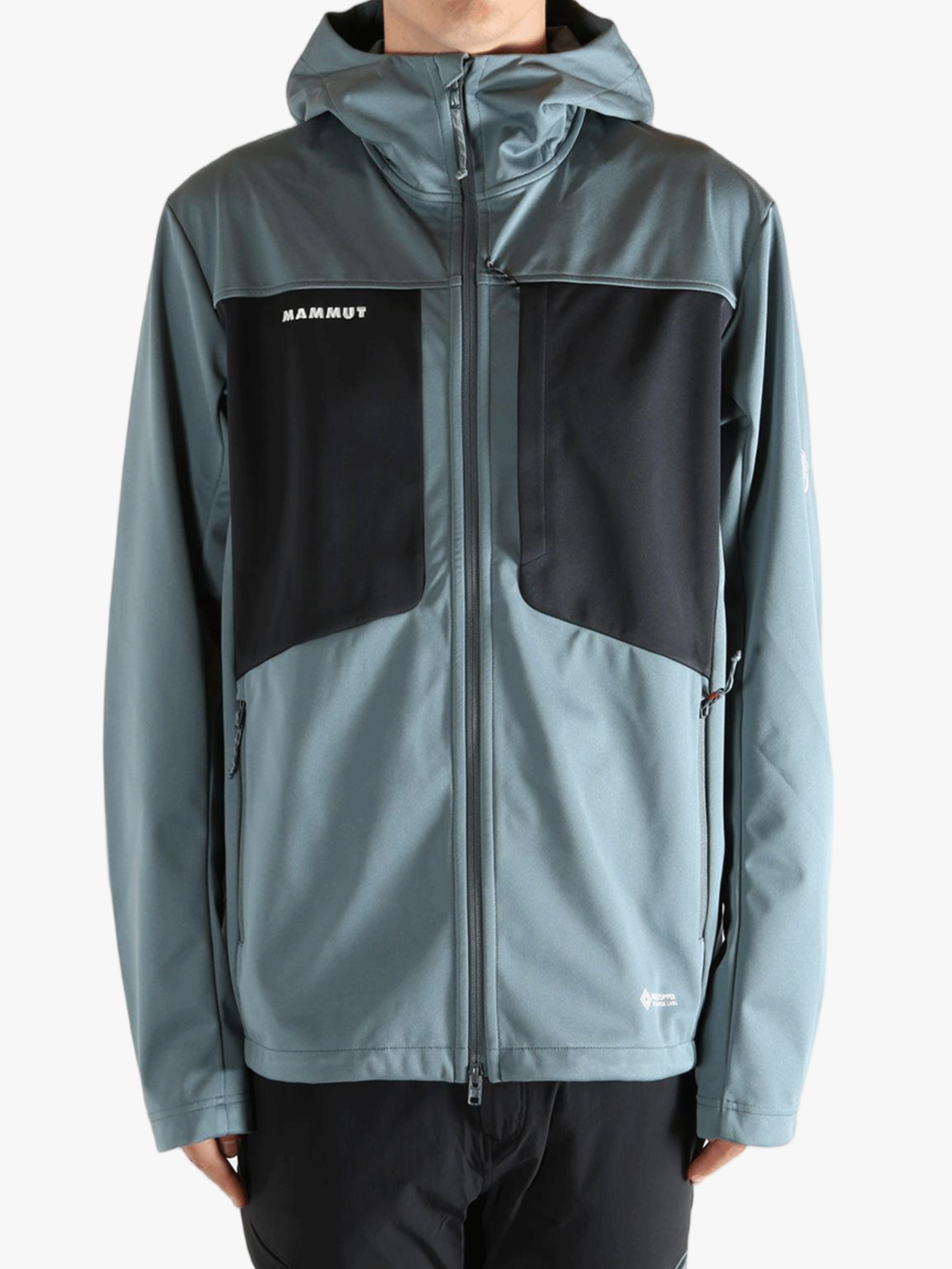 Blue jacket worn by a person, showing the jacket's fit