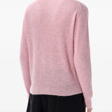 Pink shirt worn by a person, showing the shirt's fit