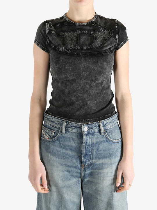 Black top worn by a person, showing the fit