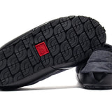 Close up of grey shoes, showing texture of the fabric