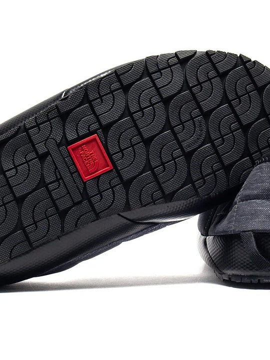 Close up of grey shoes, showing texture of the fabric